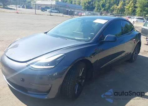 2022 Tesla Model 3 Long Range Dual Motor All-Wheel Drive z USA, uszkodzony, nr VIN 5YJ3E1EB7NF323825